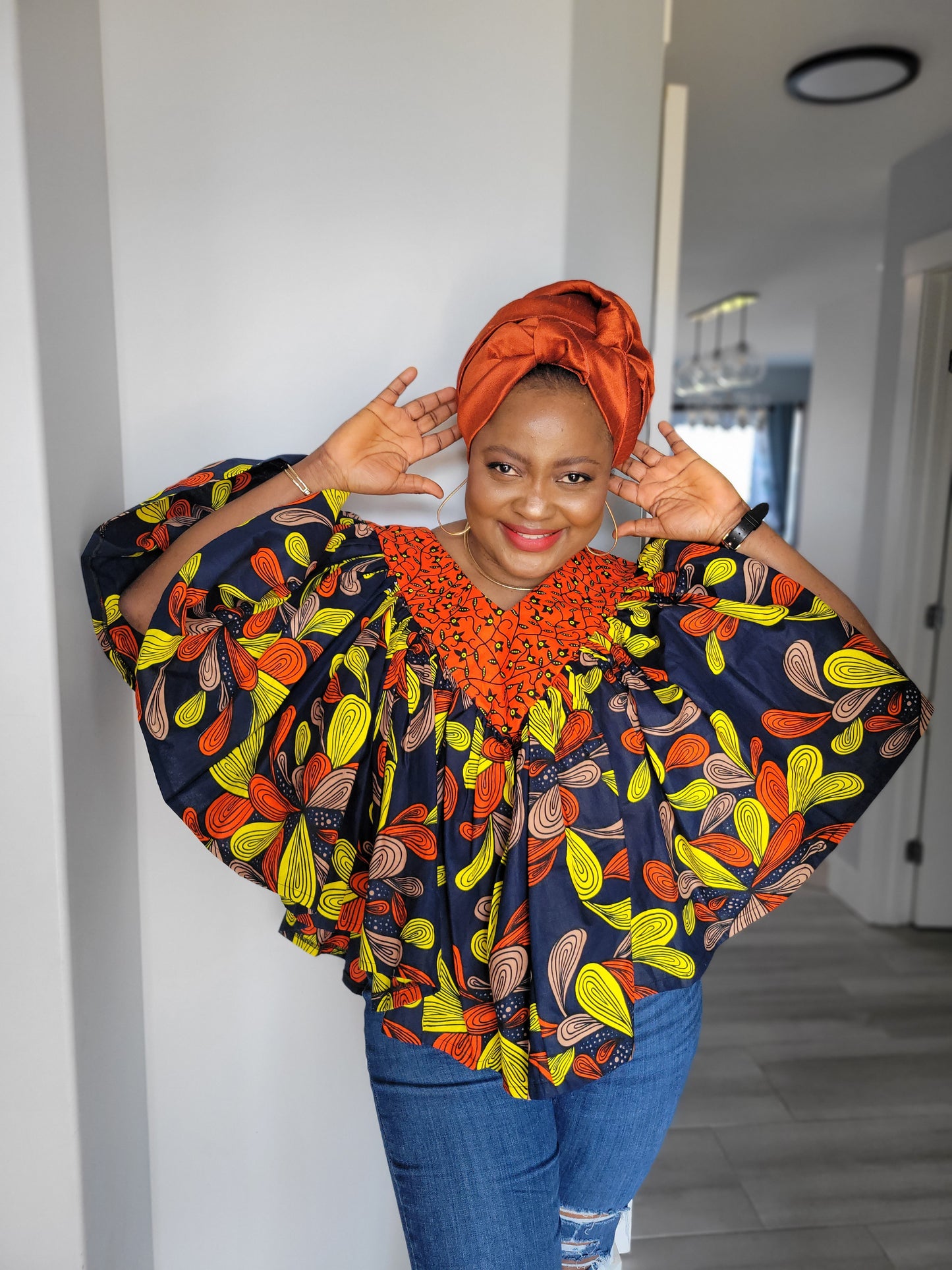 Ara Orange design cape top