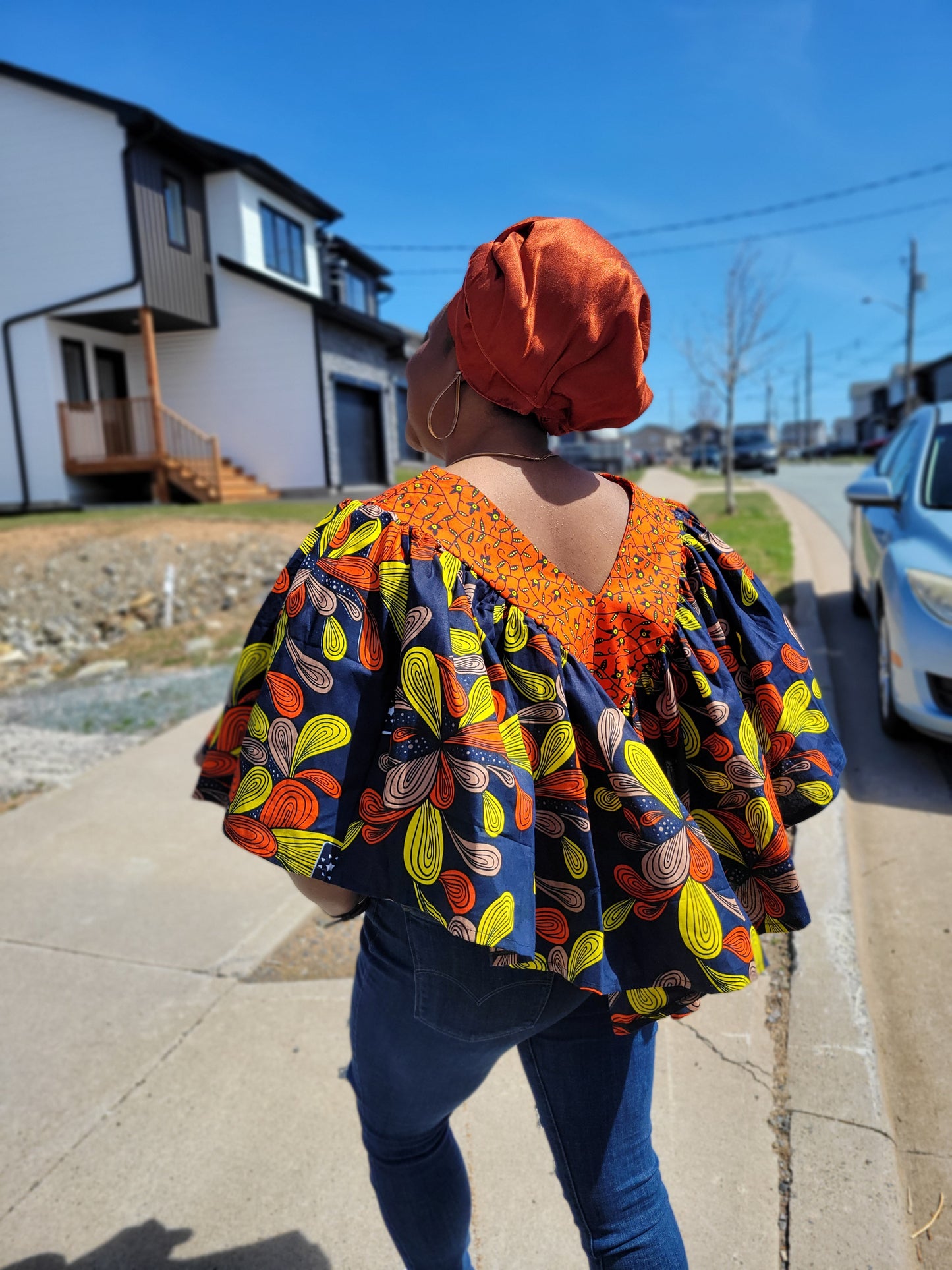 Ara Orange design cape top