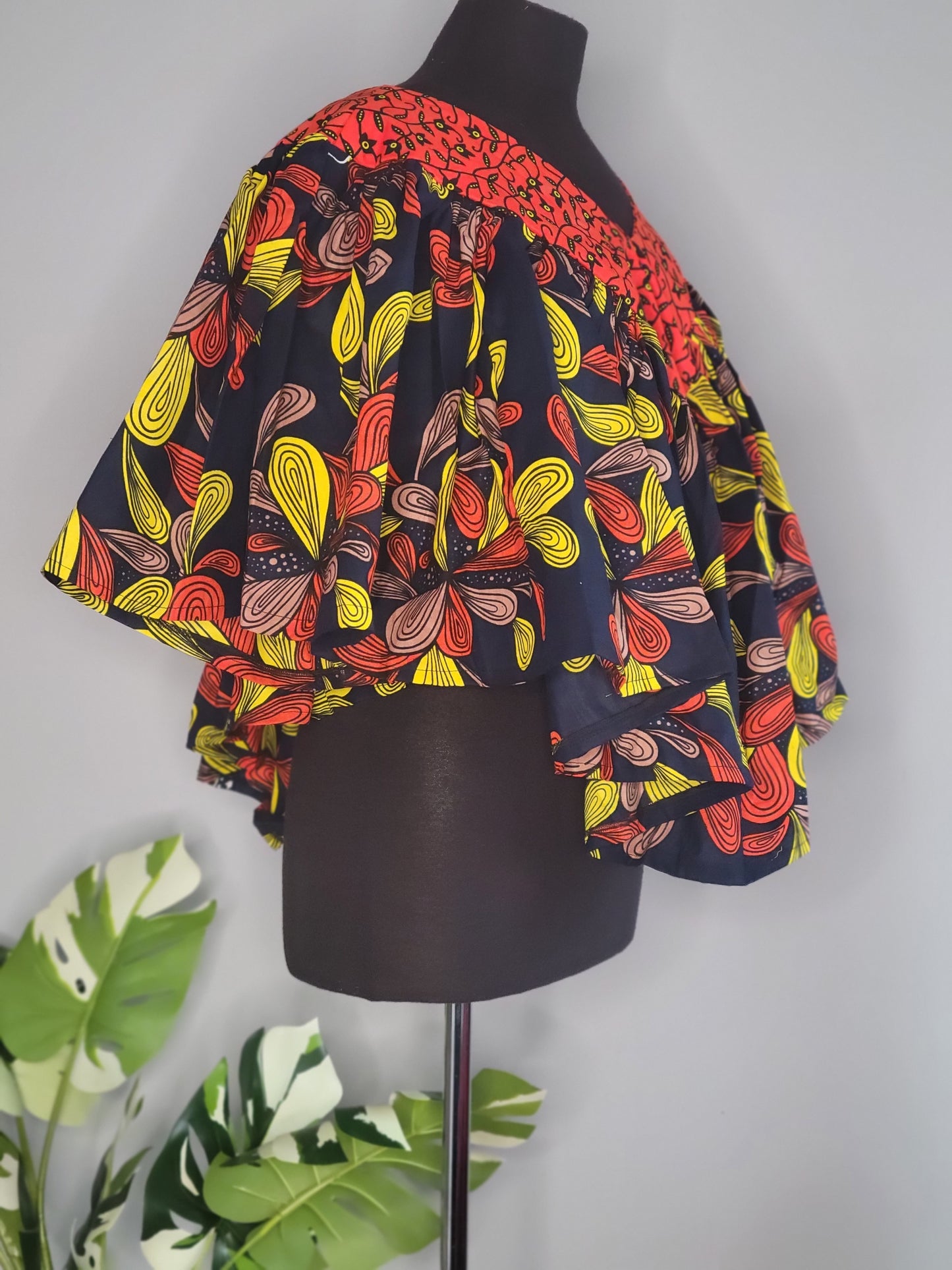 Ara Orange design cape top